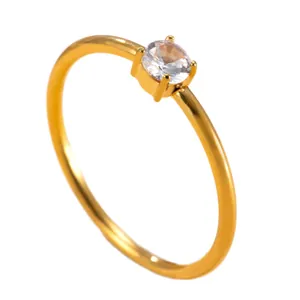 Minimalist 18k gold plated stainless steel ring with a sparkling six-prong solitaire stone.