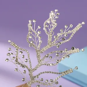 Elegant silver branch bridal headpiece adorned with shimmering crystal rhinestones