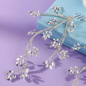 Elegant silver crystal vine bridal hairband for vintage wedding hairstyles and festive galas.