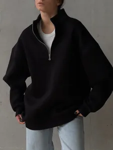Women's oversized black half-zip fleece sweatshirt with a thick stand-up collar design