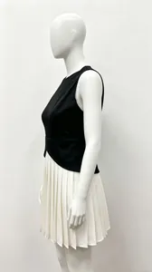 Robe plissée élégante sans manches bicolore avec taille ajustée et jupe blanche