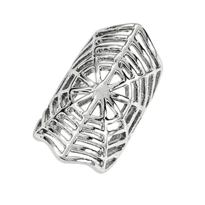 Close-up detail of silver-tone spider web ear cuff for Halloween festive jewelry