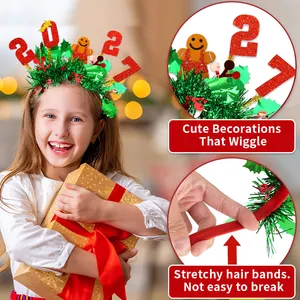 Detail showing stretchy green tinsel headband with 2027 glitter numbers and gingerbread man.