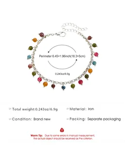 Detail view of colorful bead bracelet with silver iron chain and adjustable sizing info.