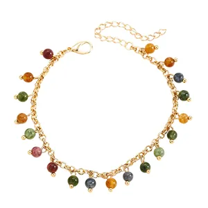 Elegant gold chain bracelet with colorful round gemstone beads in a vintage light luxury style