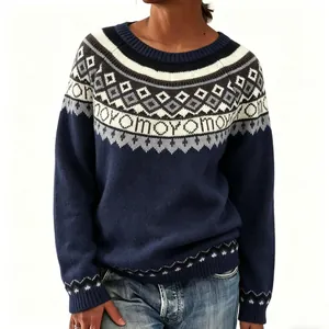Close-up of women's thick knit navy sweater with geometric jacquard yoke pattern