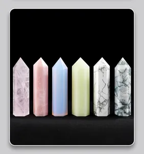 Macro detail view of six natural hexagonal crystal pillars with various colors and textures