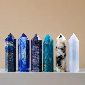 Natural hexagonal crystal pillars in varied blue and white shades for healing decor