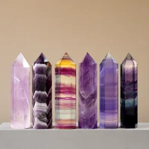 Natural crystal hexagonal towers and fluorite points for healing and home decor display