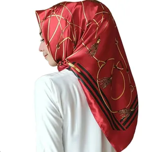 Vintage 90x90cm satin square scarf with golden chain print worn as elegant headscarf