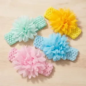Set of four baby headbands featuring colorful large chiffon flowers on soft elastic bands
