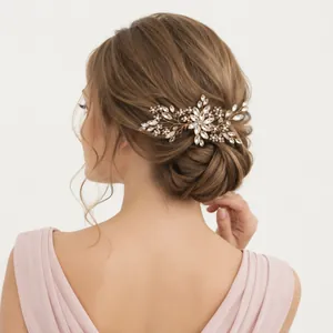 Elegant bridal floral hair comb featuring sparkling crystals and white pearls for bun styling