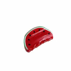 Cute watermelon slice hair claw clip made of red acrylic for creative hairstyling