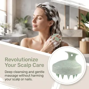 Detailed macro view of mint green wheat straw scalp massage brush in use for hair care.