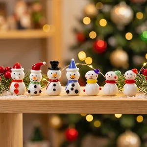 Set of 7 exquisite handmade glass snowman figurines for festive Christmas desk decoration