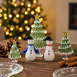Handmade glass Christmas tree and snowman figurine set for holiday table decor.