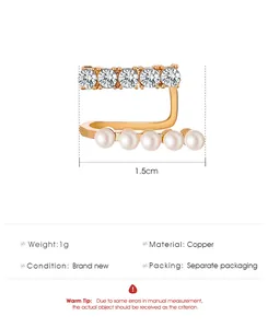 Detail view of C-shaped double-layer ear cuff with rhinestones and pearls and 1.5cm size info.