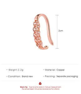 Detailed view of rose gold C-shaped ear cuff with rhinestones and 2cm height specification
