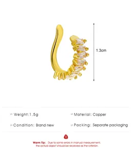 Detail showing 1.3cm gold C-shaped ear cuff with clear cubic zirconia stones