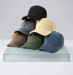 Stack of six structured cotton baseball caps in various colors with hard top design.