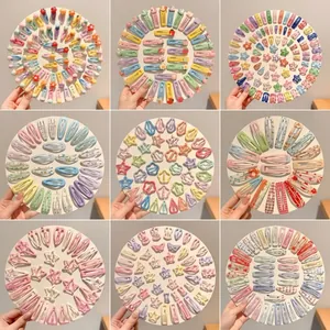 Collection of Korean style colorful snap hair clips in star, crown and oval shapes