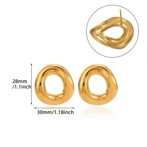Macro detail of gold-plated titanium steel stud earrings showing precise size dimensions