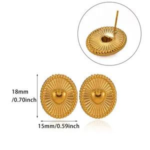 Macro view of gold-plated heart stud earrings showing 18mm by 15mm dimensions.