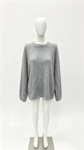 Soft gray crewneck knitted sweater with a minimalist oversized silhouette for daily wear