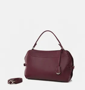 Elegant wine red leather handbag for women shown in a multi-angle studio showcase