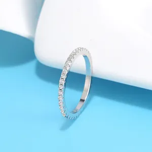Close-up detail of a minimalist S925 silver ring with full zircon stones setting