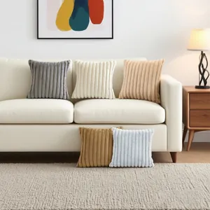 Set of high-end vertical striped plush throw pillow covers displayed on a white sofa