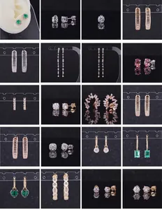 Collection of lab-grown diamond earrings in various cuts including round and emerald.