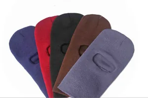 Variety of multi-colored knitted balaclava ski masks with a single hole for outdoor warmth