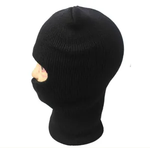Detailed side view of a warm black knitted one-hole balaclava ski mask for men