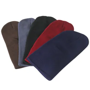 Set of five colorful warm knitted long beanies for autumn and winter outdoor activities