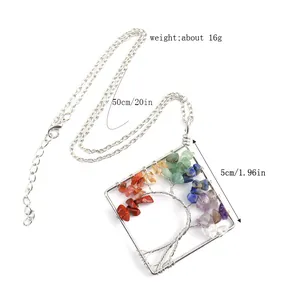 Detailed view of the handmade wire wrapped tree of life necklace with dimensions