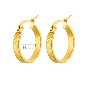 18mm gold plated hoop earrings featuring diagonal textured patterns macro detail view