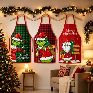 Festliche Weihnachtsschürzen mit Grinch- und Weihnachtsmann-Motiven in gemütlichem Zimmer