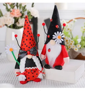 Detailed view of ladybug themed plush gnomes for Christmas and holiday home decoration