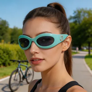 Detail view of mint green Y2K cycling sunglasses with stylish oval lenses and temple logo.