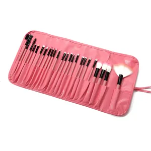 Juego profesional de 24 brochas de maquillaje en un estuche enrollable de color rosa