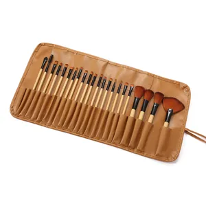 Juego de 24 brochas de maquillaje profesionales con estuche portátil de cuero PU marrón.