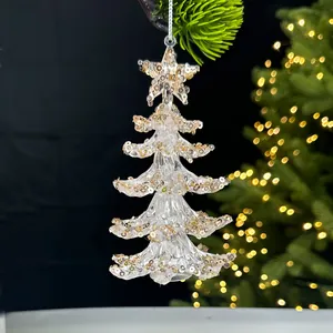Eleganter Weihnachtsbaumschmuck aus Acryl mit goldenen Pailletten und einer Sternspitze