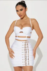 Hot sexy white bandage two-piece set featuring cutout crop top and gold buckle mini skirt