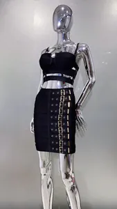 Detailed close-up of a black two-piece bandage set featuring a buckle mini skirt