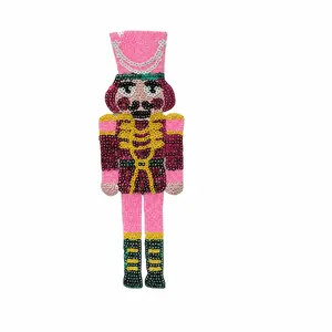 Detailed sequin nutcracker soldier patch with dimensions 19.5cm height and 4g weight