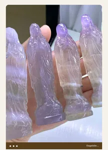 Macro view of natural macaron fluorite crystals carved into elegant figure statues