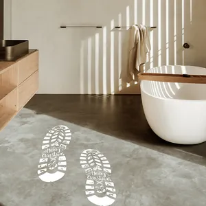 Autocollants de sol empreintes de Père Noël blancs dans une salle de bain moderne