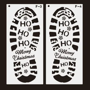 Detailed view of Christmas Santa footprint stencils with Merry Christmas and HO HO HO cutouts
