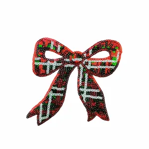Detail of Christmas plaid sequin bow patch with 11x12cm dimensions and 2g weight